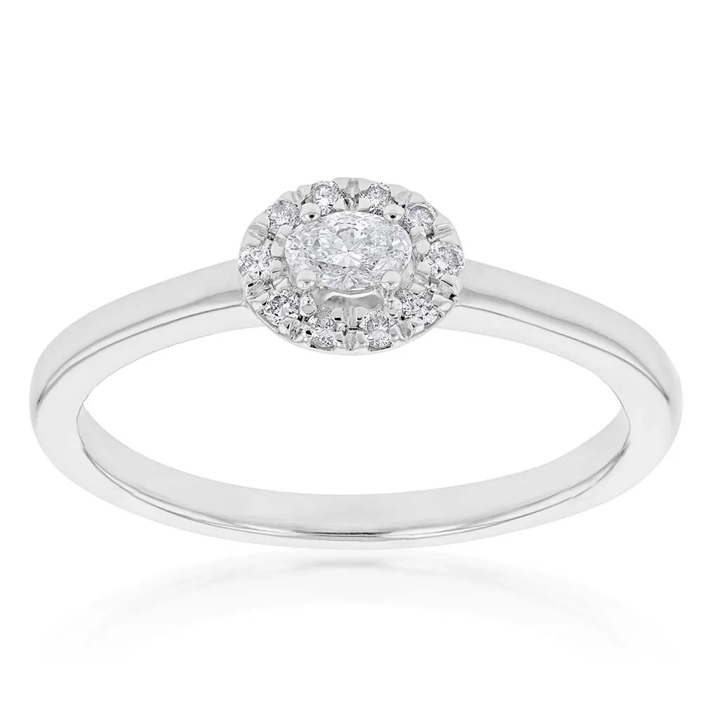 10ct White Gold 1/6 Carat Diamond Ring with Oval Centre and Halo