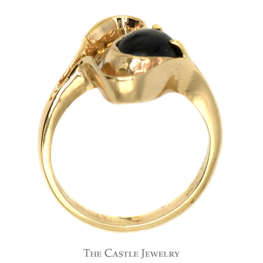 10k Yellow Gold Ring Featuring Open Free Form Design and Oval Cabochon Black Star Gemstone