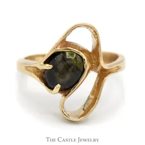 10k Yellow Gold Ring Featuring Open Free Form Design and Oval Cabochon Black Star Gemstone