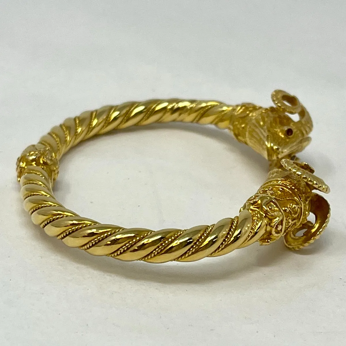 18K Gold Ramus Head Hinged Cuff Bracelet with Ruby Eyes