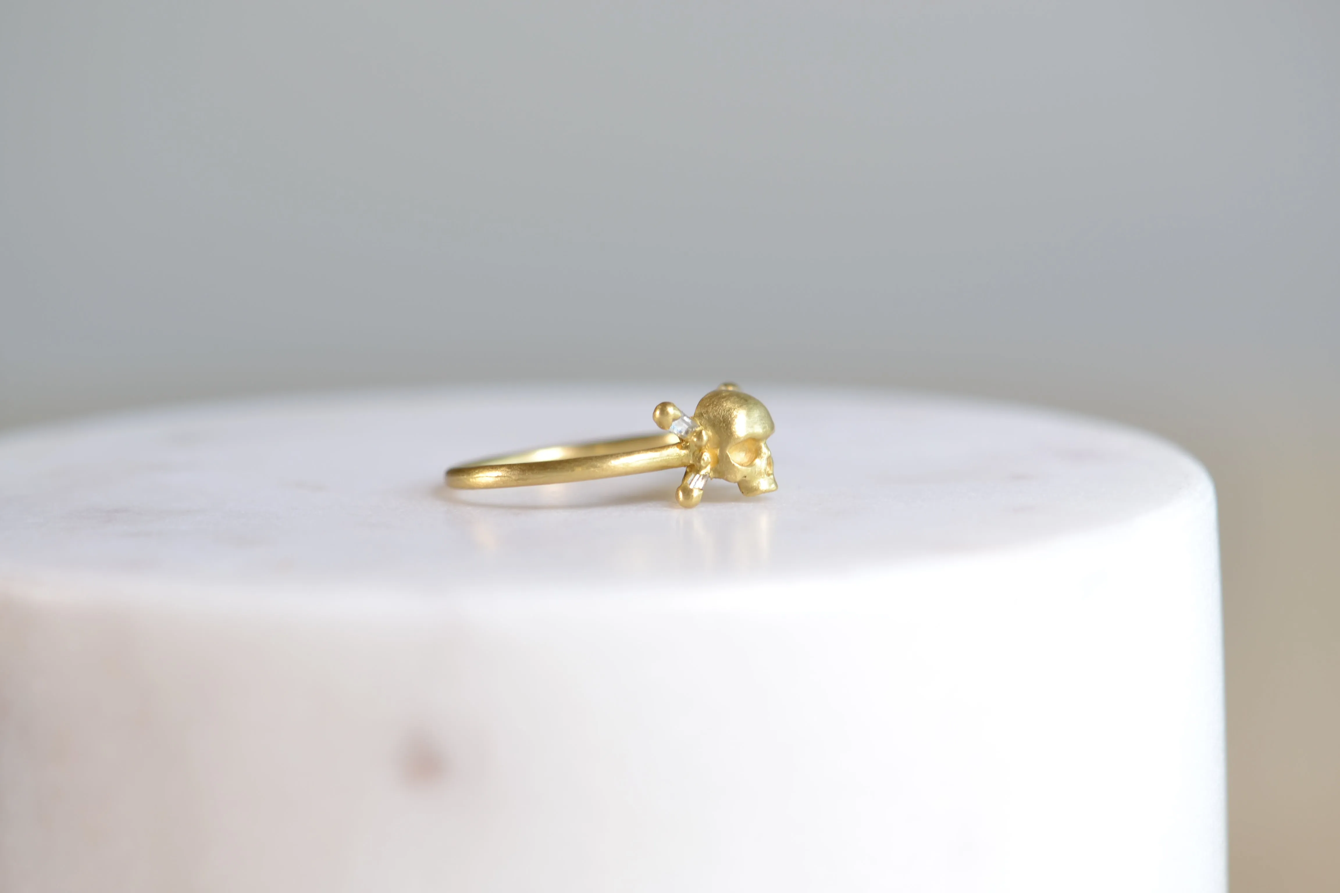 Small Skull Ring with Baguette Diamonds